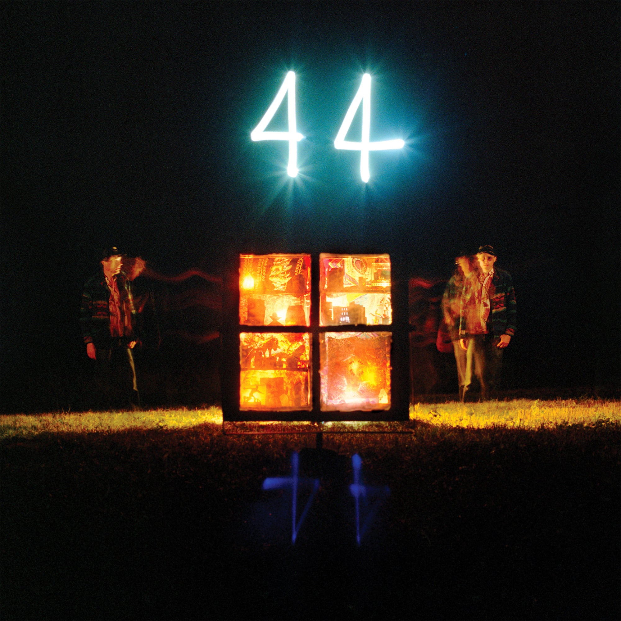 44 by Joel Plaskett artwork from the CD boxset shot at night with lit up "44"