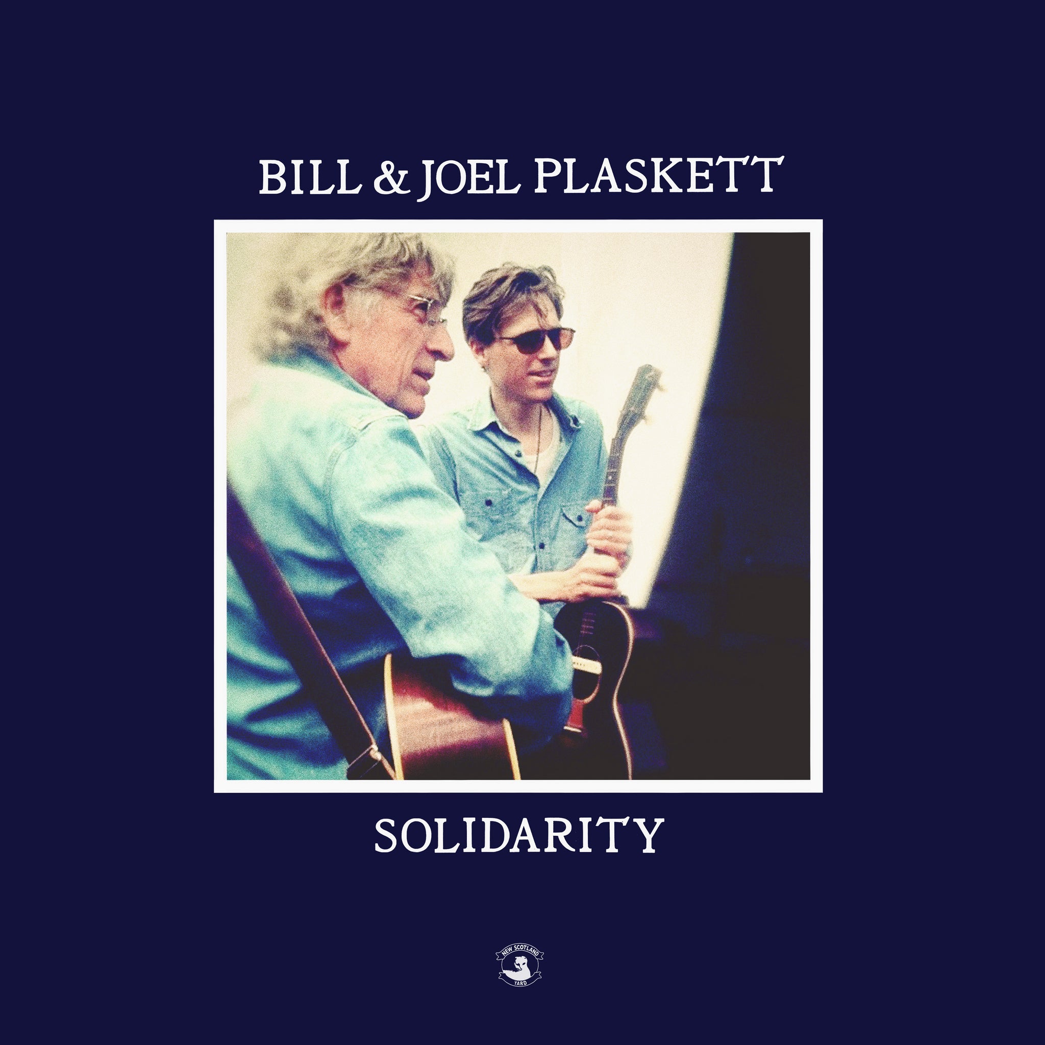 Joel Plaskett Solidarity album cover "Bill & Joel Plaskett" image of Joel and Dad on a navy background